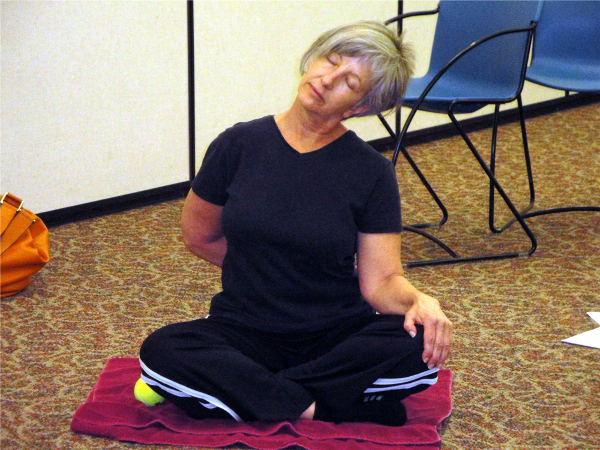 A trapezius stretch leads to a zen moment.